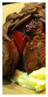 Spicy lamb kabobs over mashed potatoes he made for me.